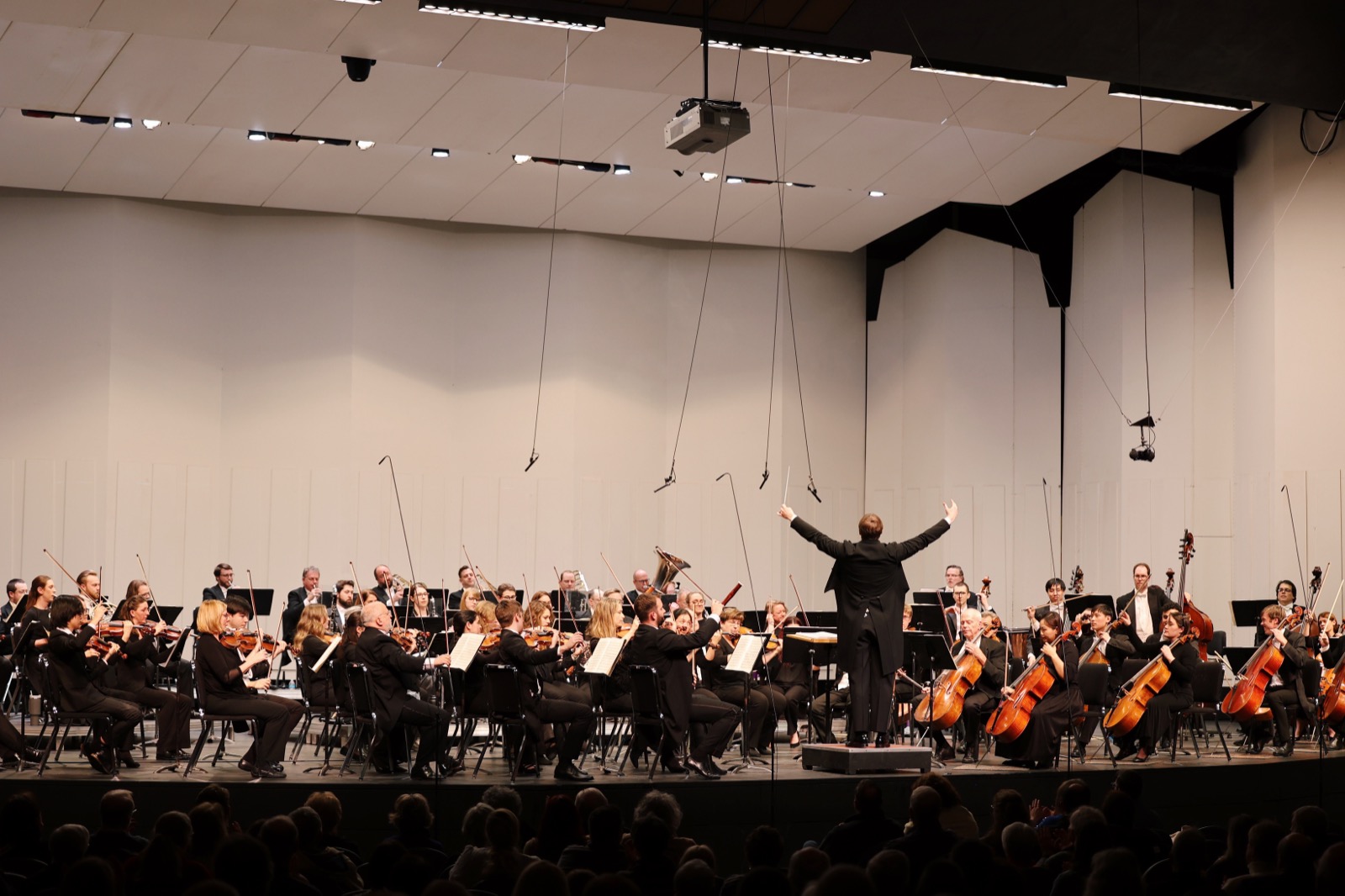 Conductor leading the Canton Symphony Orchestra
